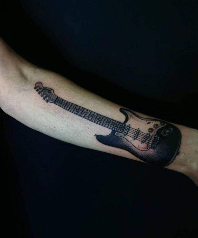 20 Trendy Guitar Tattoos You Must Love